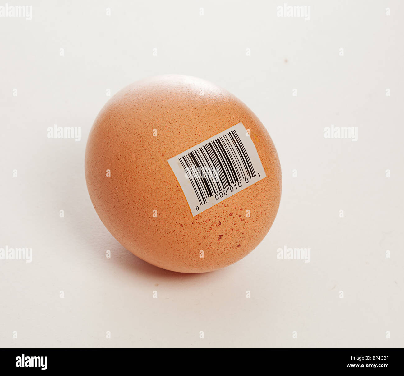Egg isolated against white background with bar code label Stock Photo