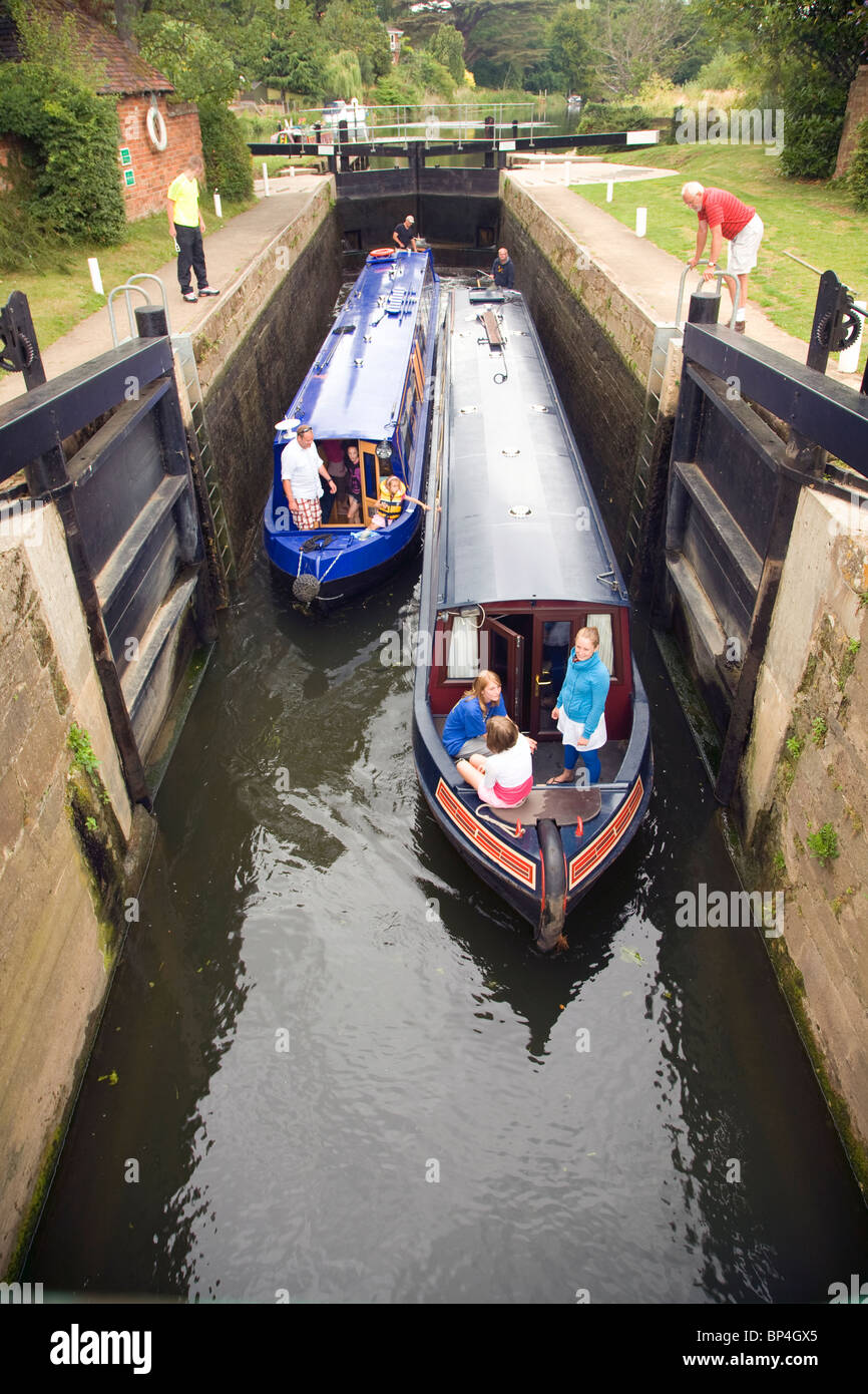 Navigating narrow boat lock River Avon, Fladbury, Worcestershire