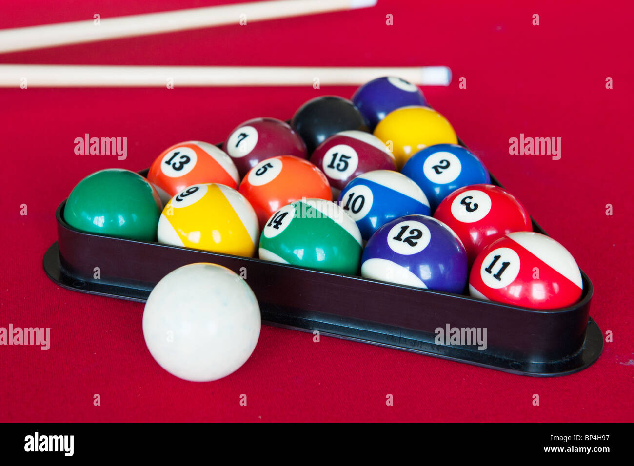 Pool billiards on red table to play Stock Photo Alamy