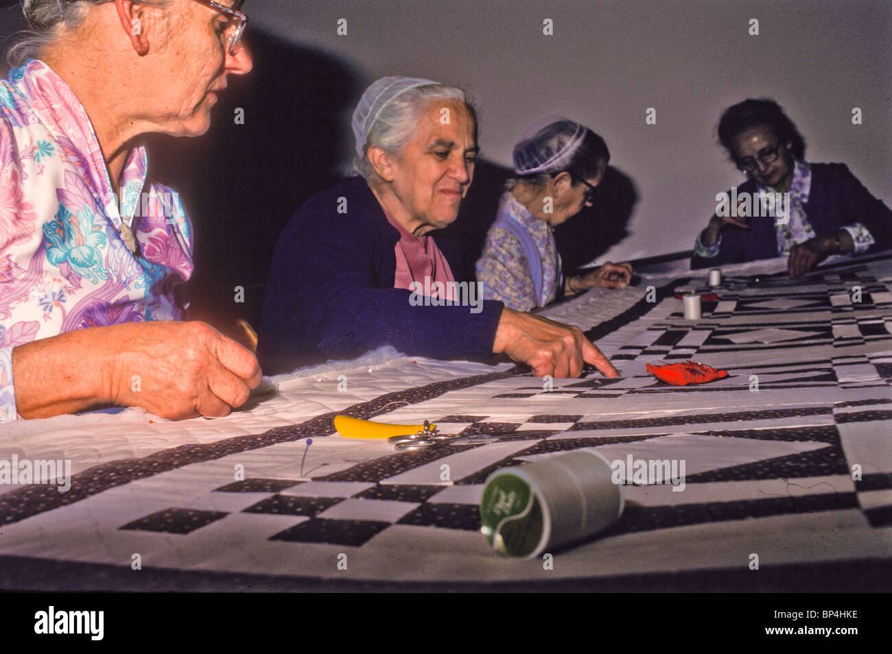 Women quilting colonial hi-res stock photography and images - Alamy