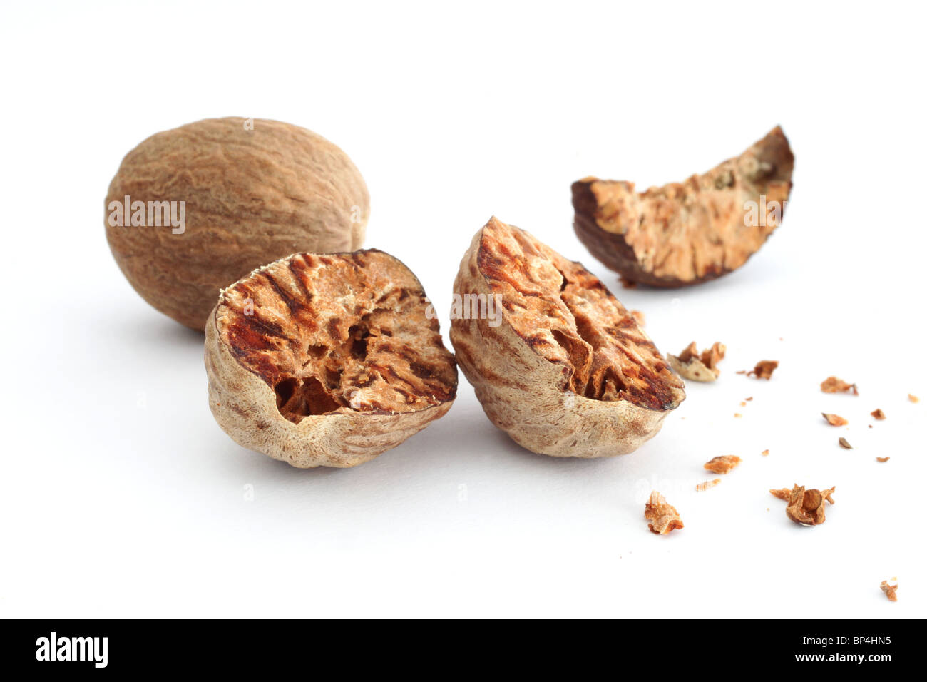 Nutmeg over white background Stock Photo