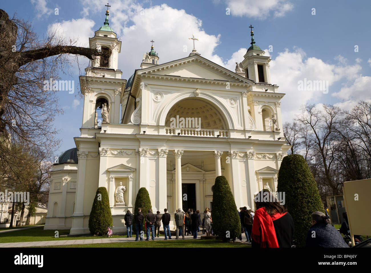 People praying outside St. Ann's Church in Wilanow, Warsaw Poland. Stock Photo