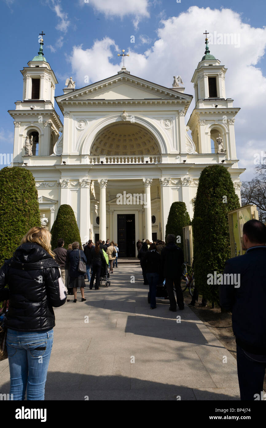People praying outside St. Ann's Church in Wilanow, Warsaw Poland. Stock Photo