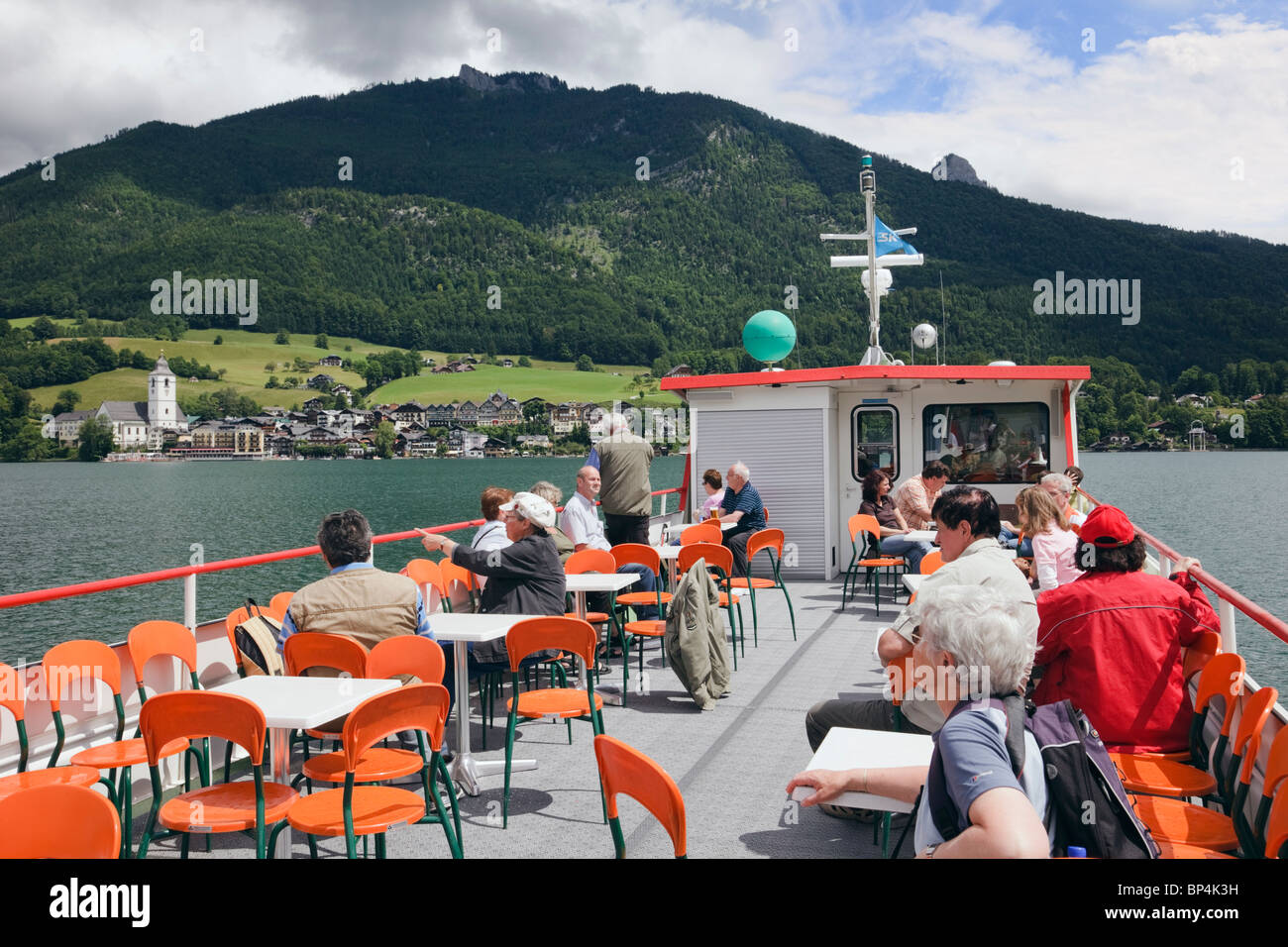 St Wolfgang, Salzkammergut, Upper Austria, Austria, Europe. Passengers on Gschwen ferry pleasure cruise boat on Wolfgangsee lake Stock Photo