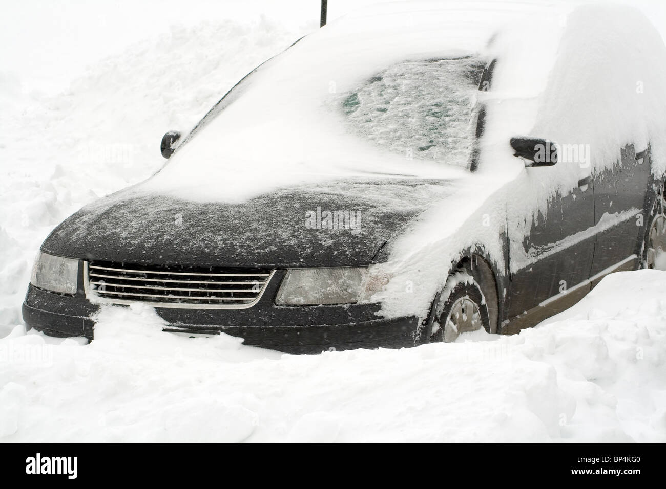 European car in snowbank. Stock Photo