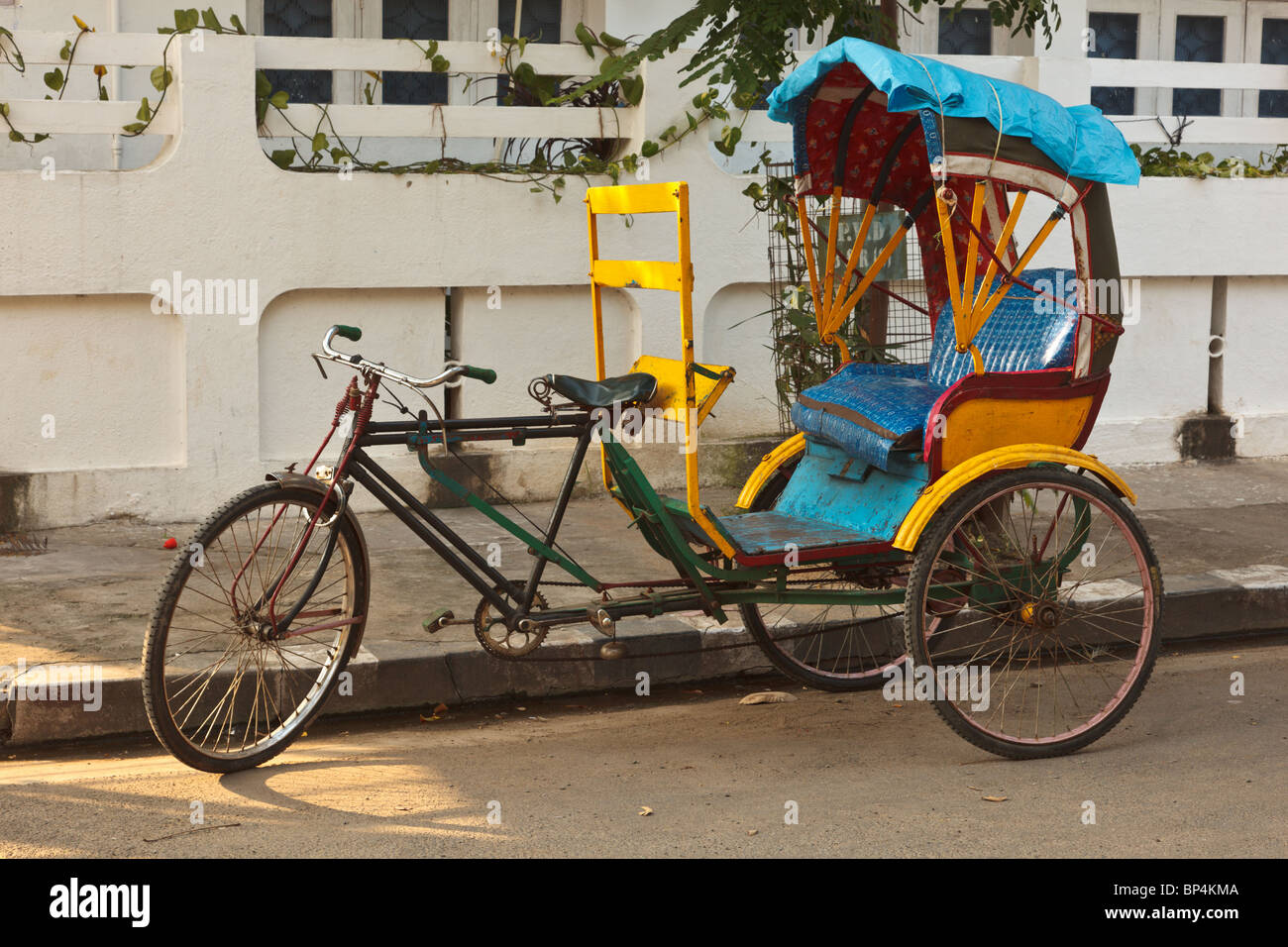 Empty bicycle rickshaw in street. Pondicherry, South India Stock Photo
