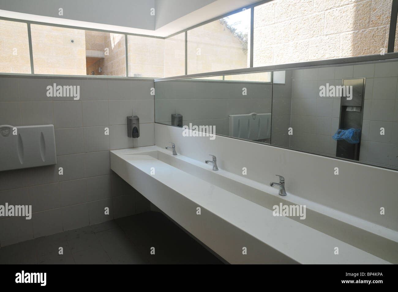 Public bathroom taps hi-res stock photography and images - Alamy