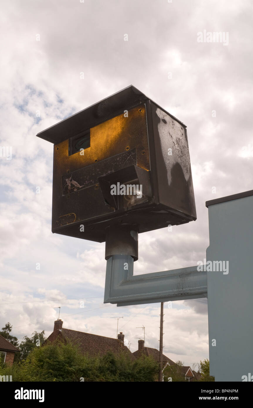 A burnt out broken damaged Gatso speed camera probably vandalised Stock