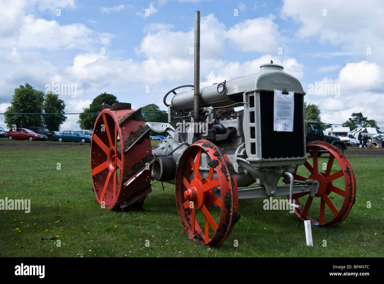 restored vintage grey fordson tractor with steel wheels at the astle park show ground Stock Photo