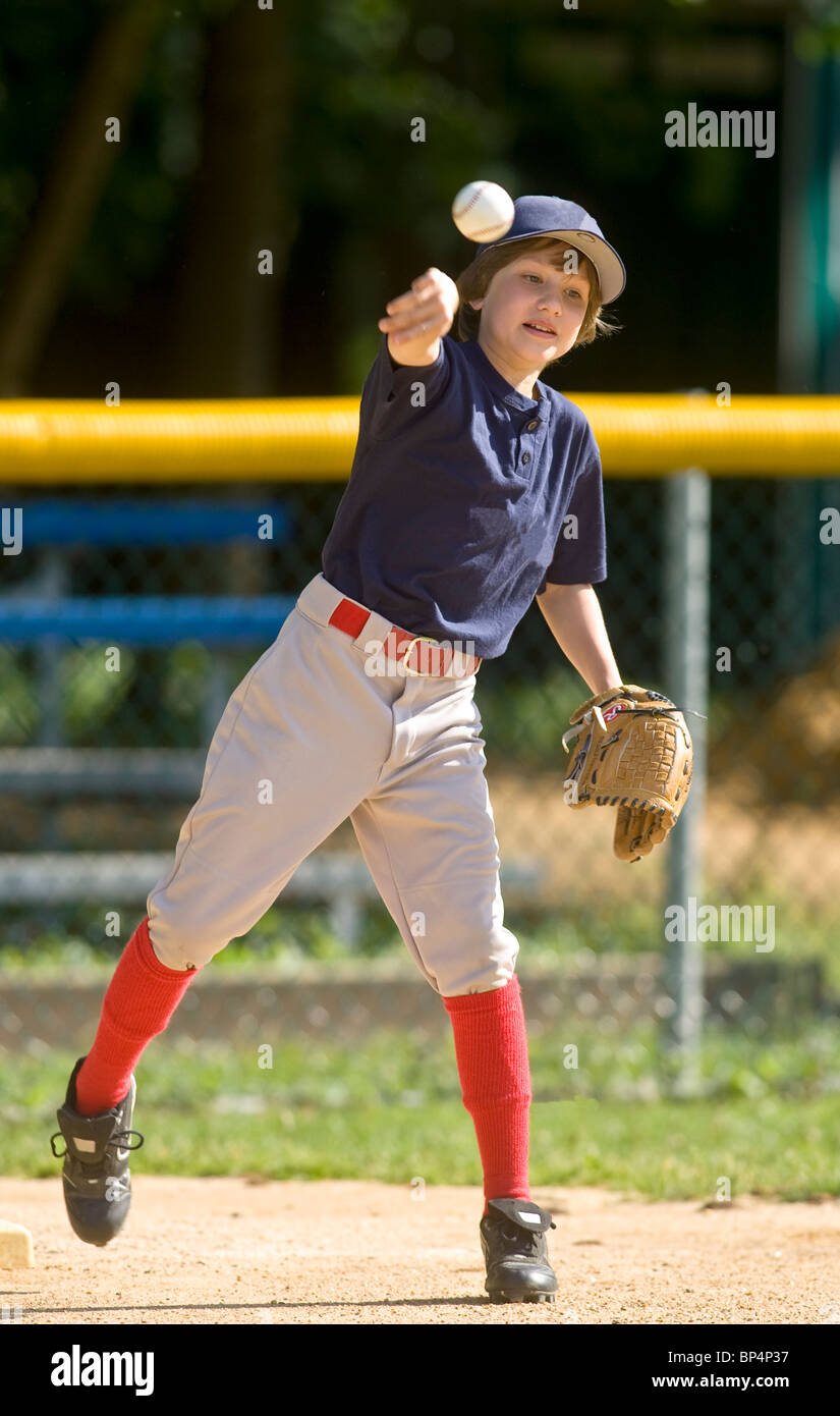 Boys baseball game action Stock Photo Alamy