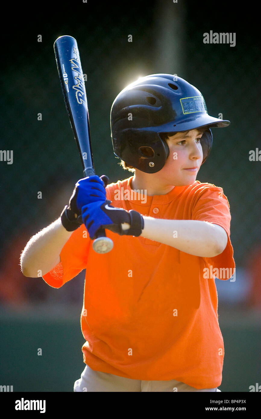 Boys baseball game action Stock Photo Alamy