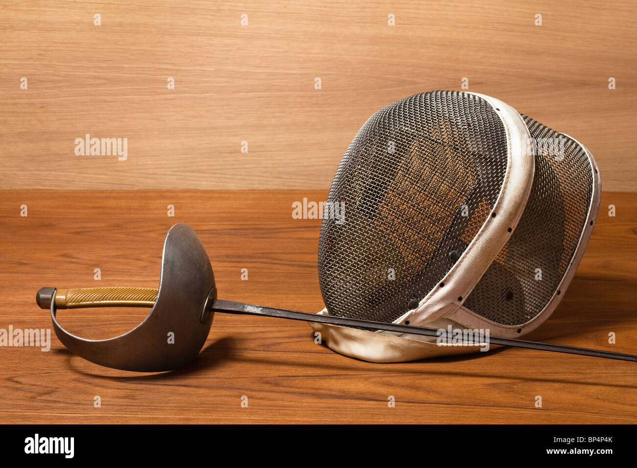 fencing mask and sword Stock Photo