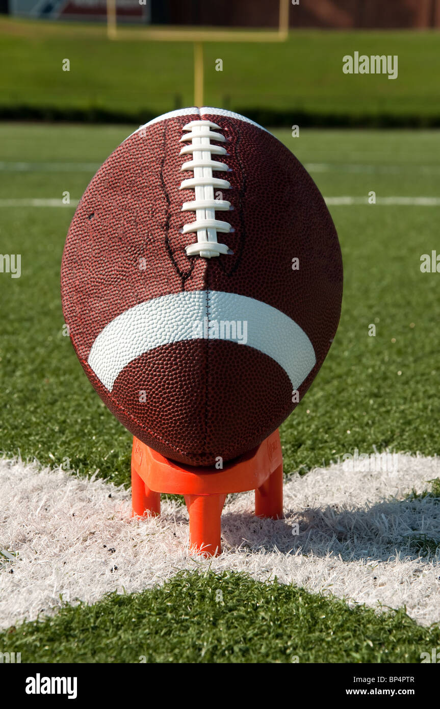American Football on Kicking Tee on Field Stock Photo Alamy
