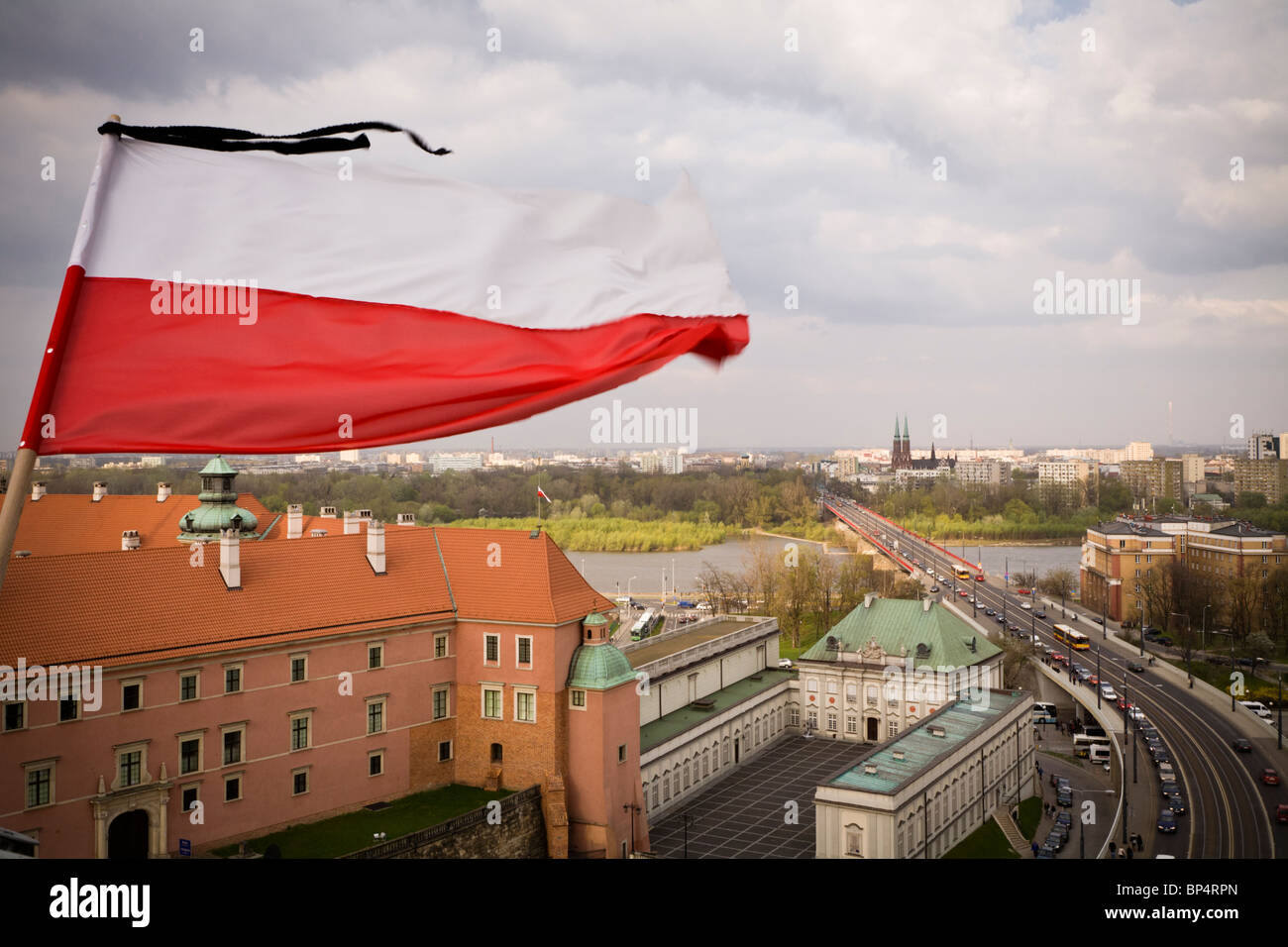 Warsaw Poland:  Flag and black ribbons in memory of president Lech Kaczynski and 95 others... Stock Photo