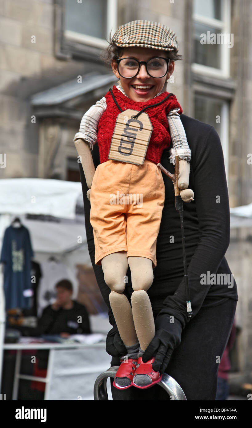 Young actress promoting a performance of Kafka's Metamorphosis in the Royal Mile/High Street, Edinburgh Festival Fringe. Stock Photo