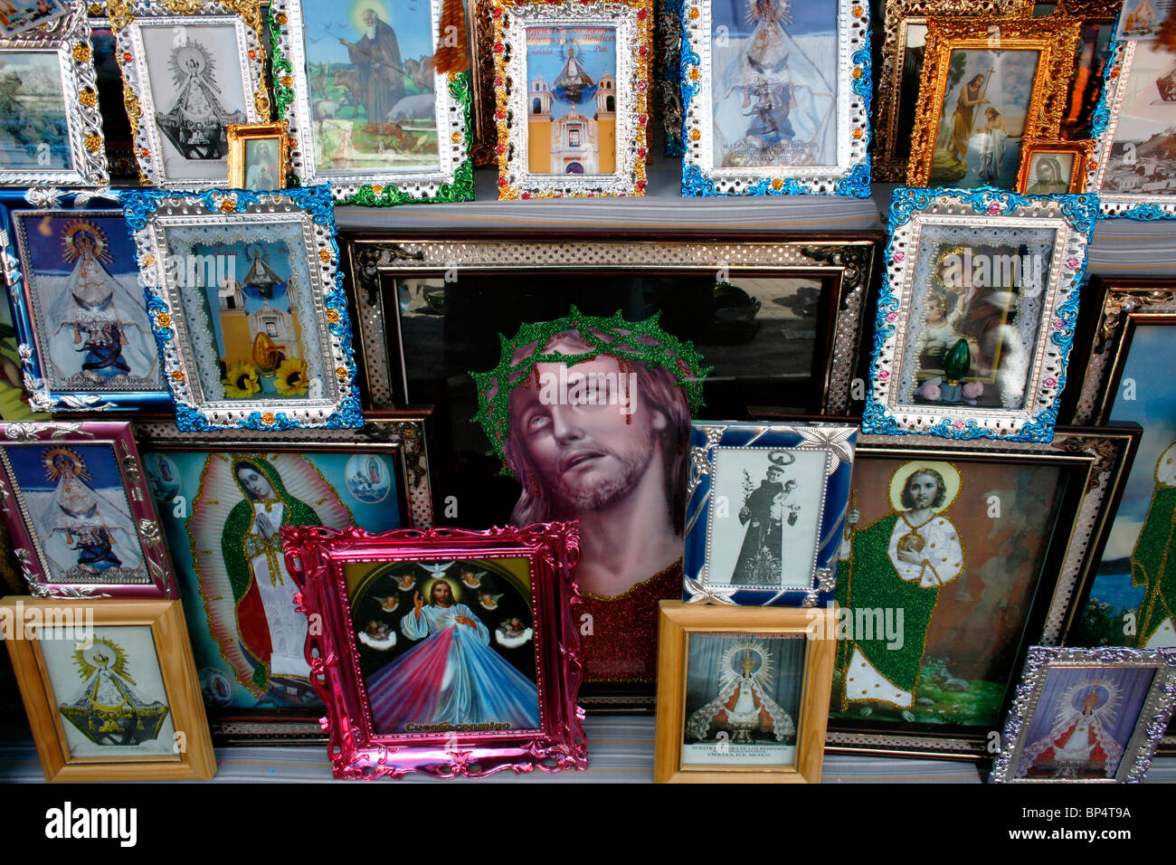 Religious images for sale in a shop in Cholula, Puebla State, Mexico, September 17, 2007. Stock Photo