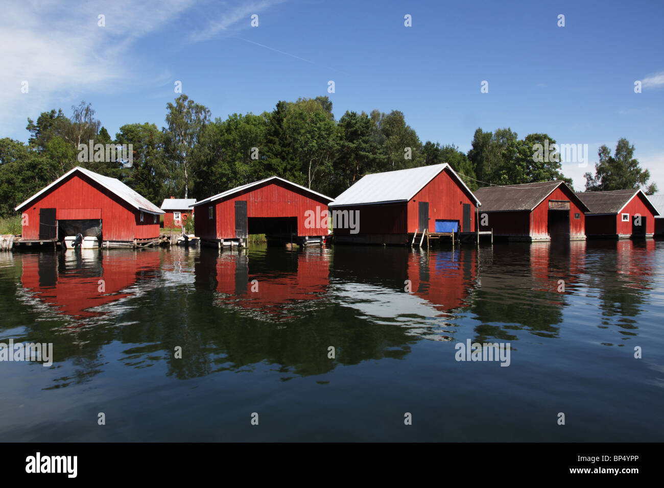 A row of boathouses in Västeränga, Lemland on the Aland island archipelago Finland Stock Photo
