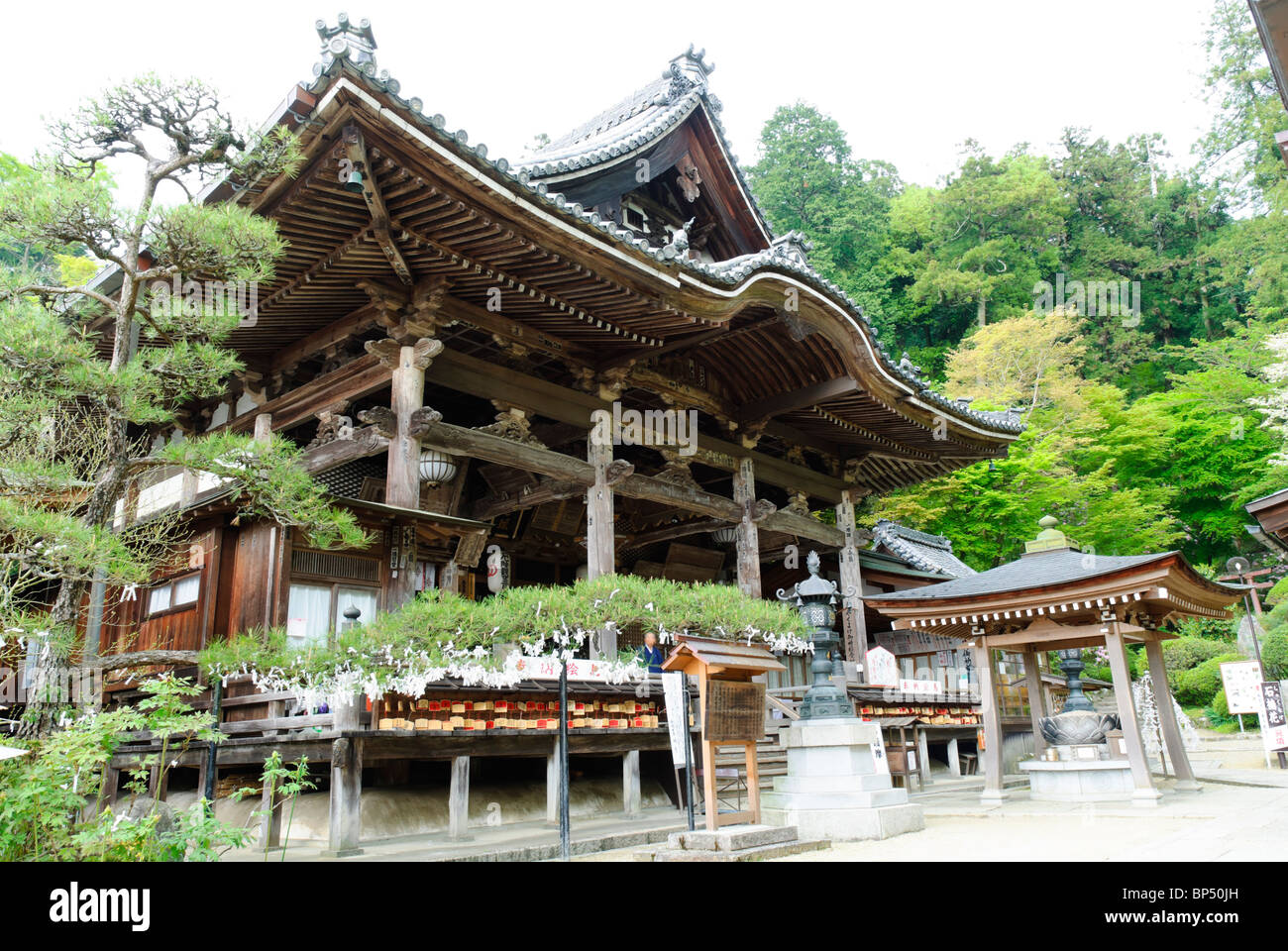 Main hall (Kondo or Hondo) of a large old wooden Japanese Buddhist temple; Asuka period temple; kondo; main hall; elaborate woodwork Stock Photo