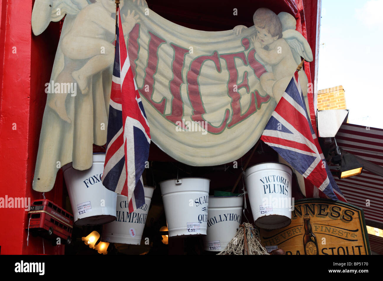 A patriotic shop entrance and bric-a-brac in Portobello Road, Notting Hill, Kensington & Chelsea, London, W11. Stock Photo