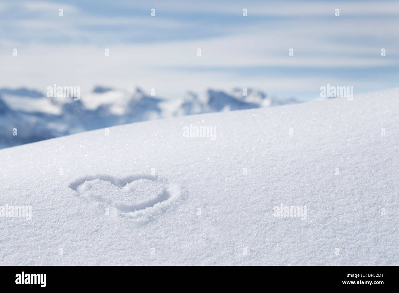 Hand Drawn Heart In Snow With Mountain Range Stock Photo 30844516