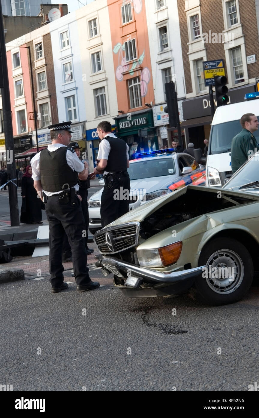 London Metropolitan Police attending Road accident scene, England, UK, Europe, EU Stock Photo