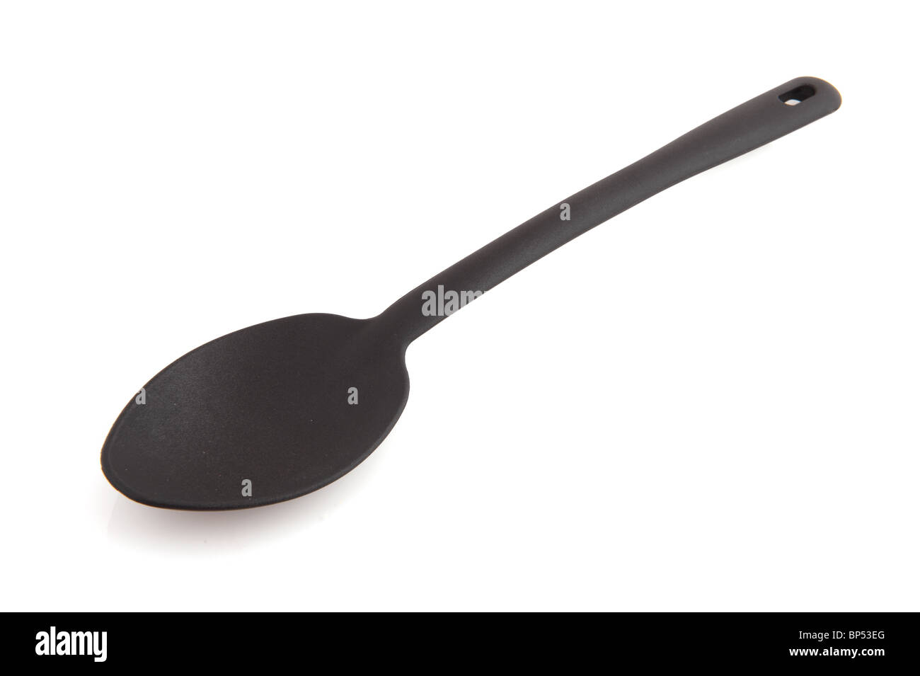 Big black spoon isolated over white background Stock Photo Alamy