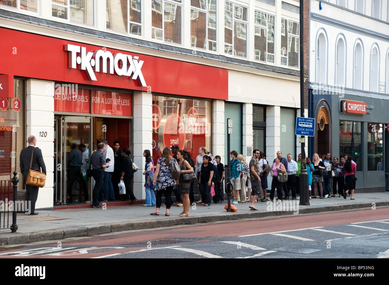 T.K. Maxx, new store opening with queue of people at Charring Cross Road, London, England, UK, Europe, EU Stock Photo