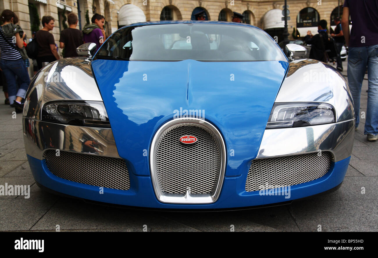 The Bugatti Veyron 100th edition blue in front of the Ritz at Paris (Place Vendôme). Stock Photo