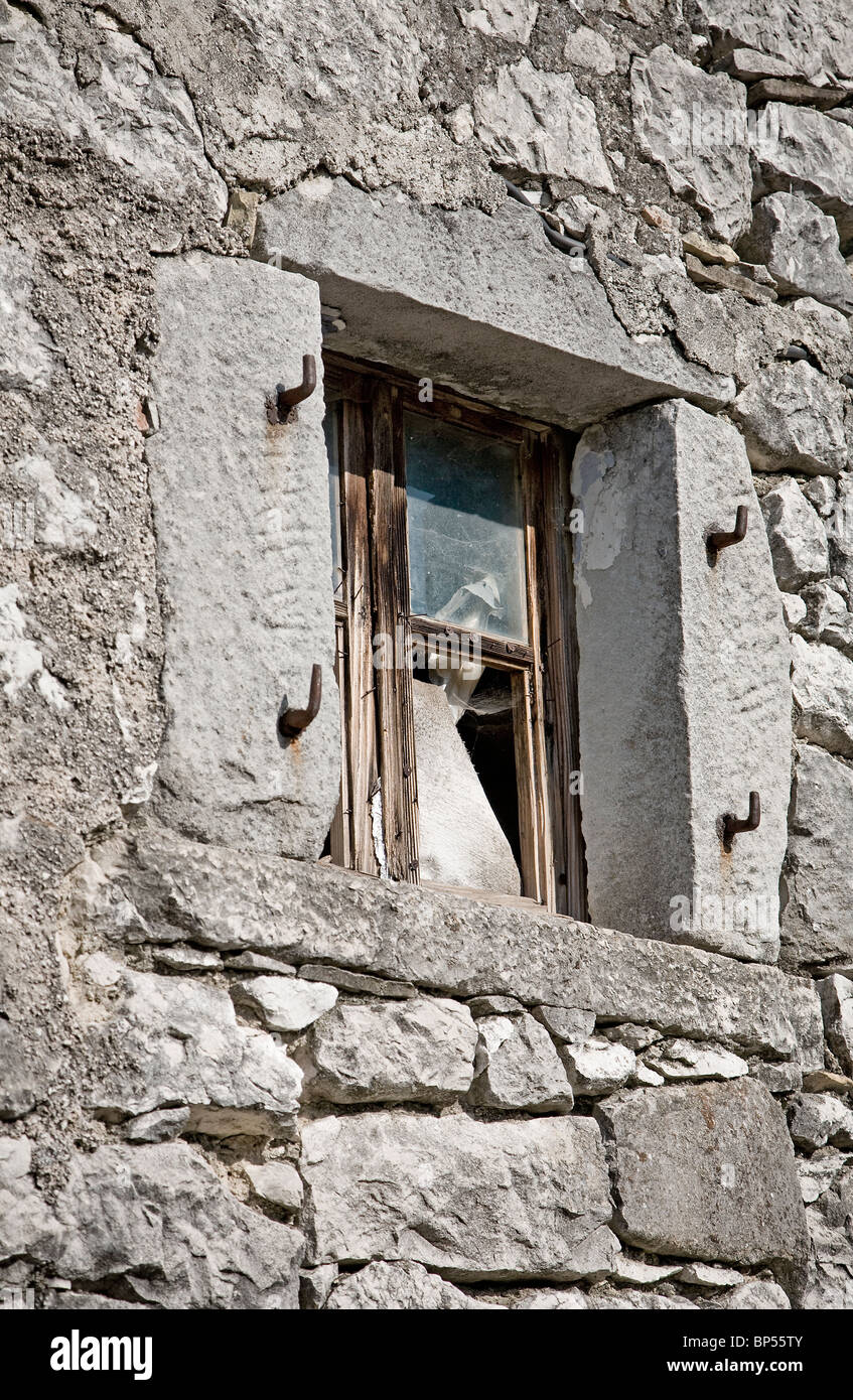 Old window on a abandoned stone house Stock Photo - Alamy
