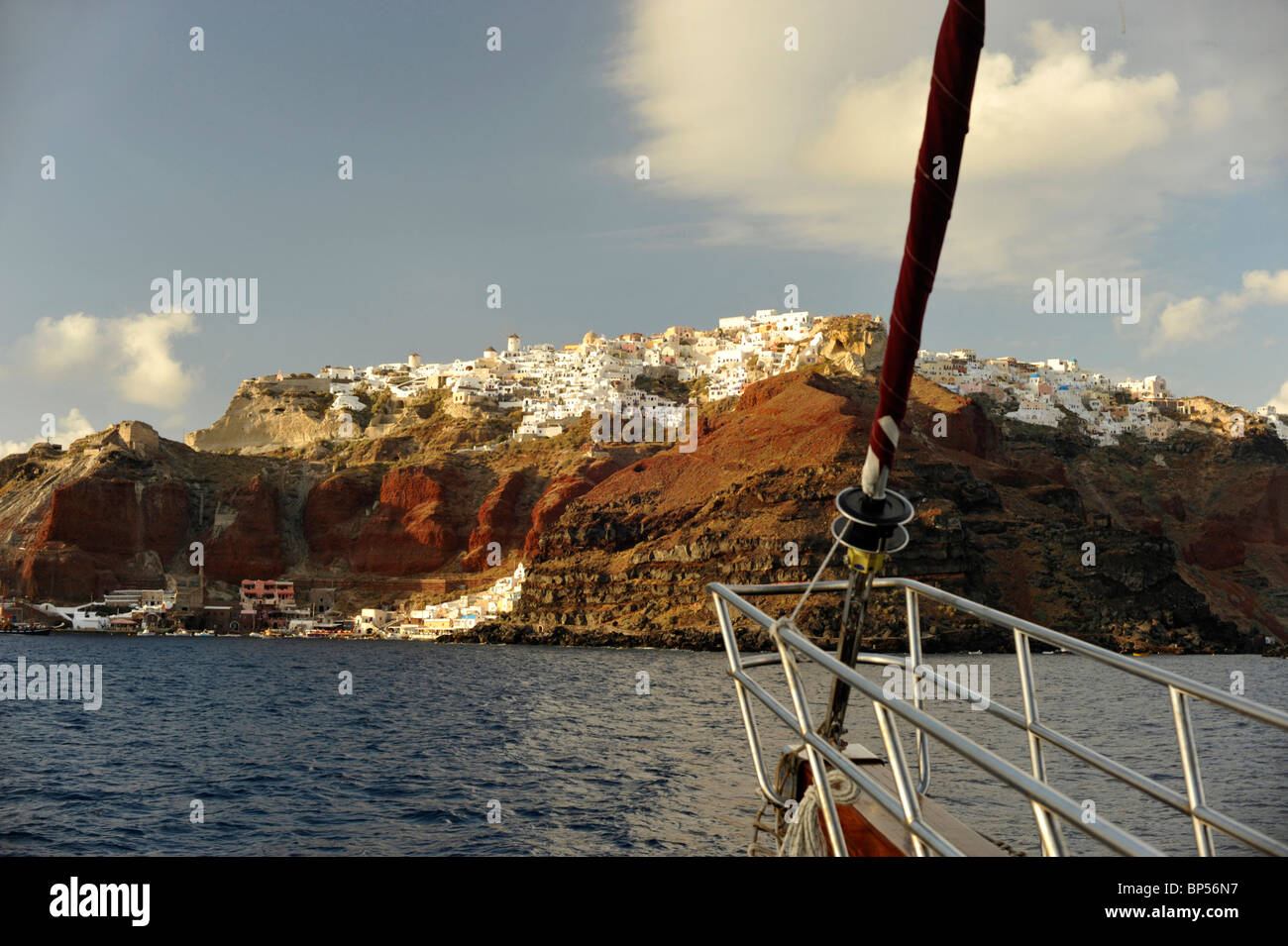 View of the town of Oia on the Island of Santorini from the front of a tourist boat. Stock Photo