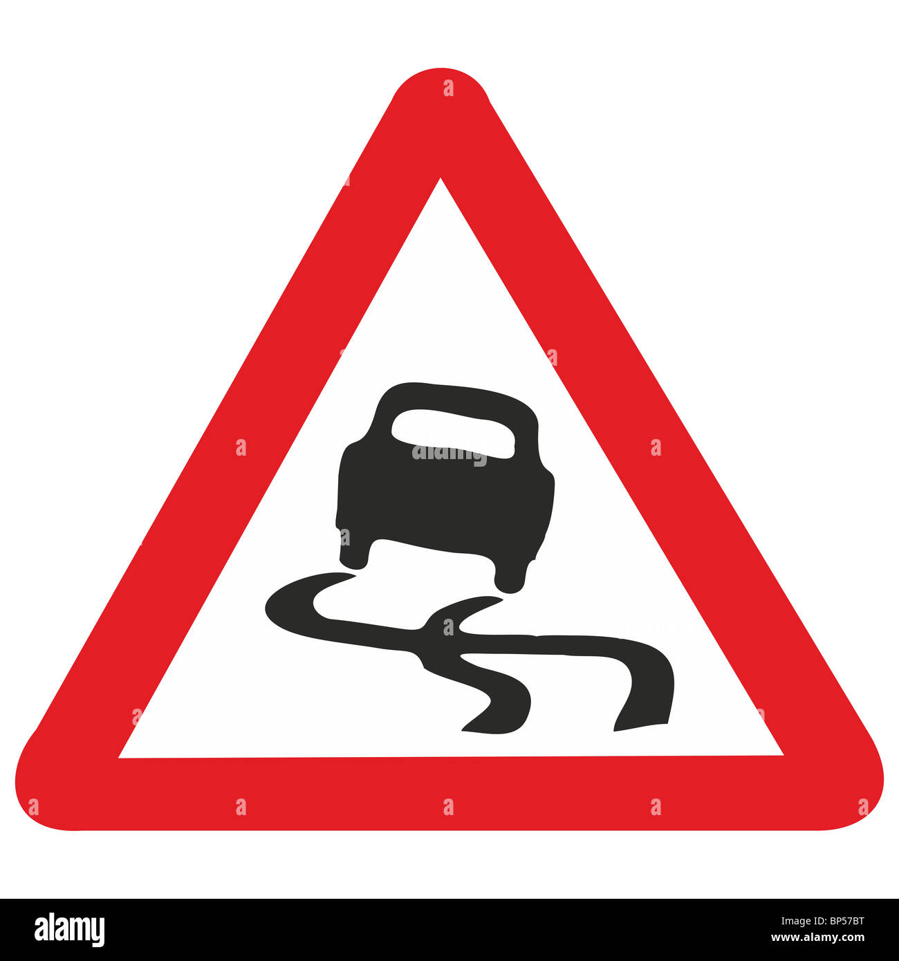 uk road sign slippery road surface risk of skidding car Stock Photo