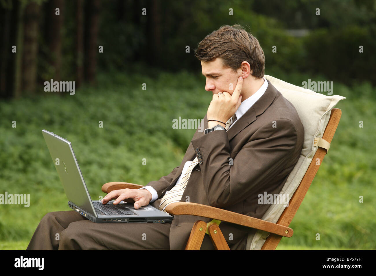 Young man with a laptop Stock Photo