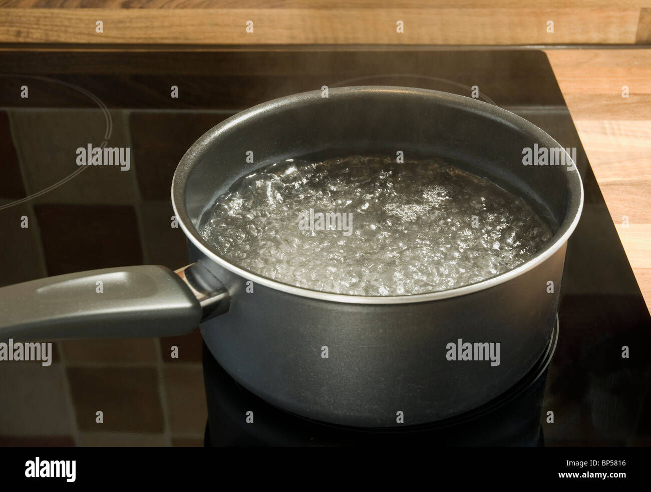 Saucepan of boiling water Stock Photo