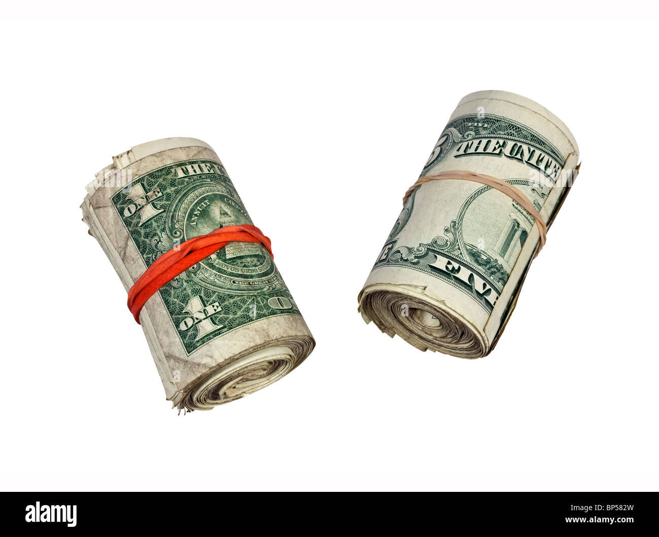 Rolls of dirty street cash. Small bills only please. Stock Photo