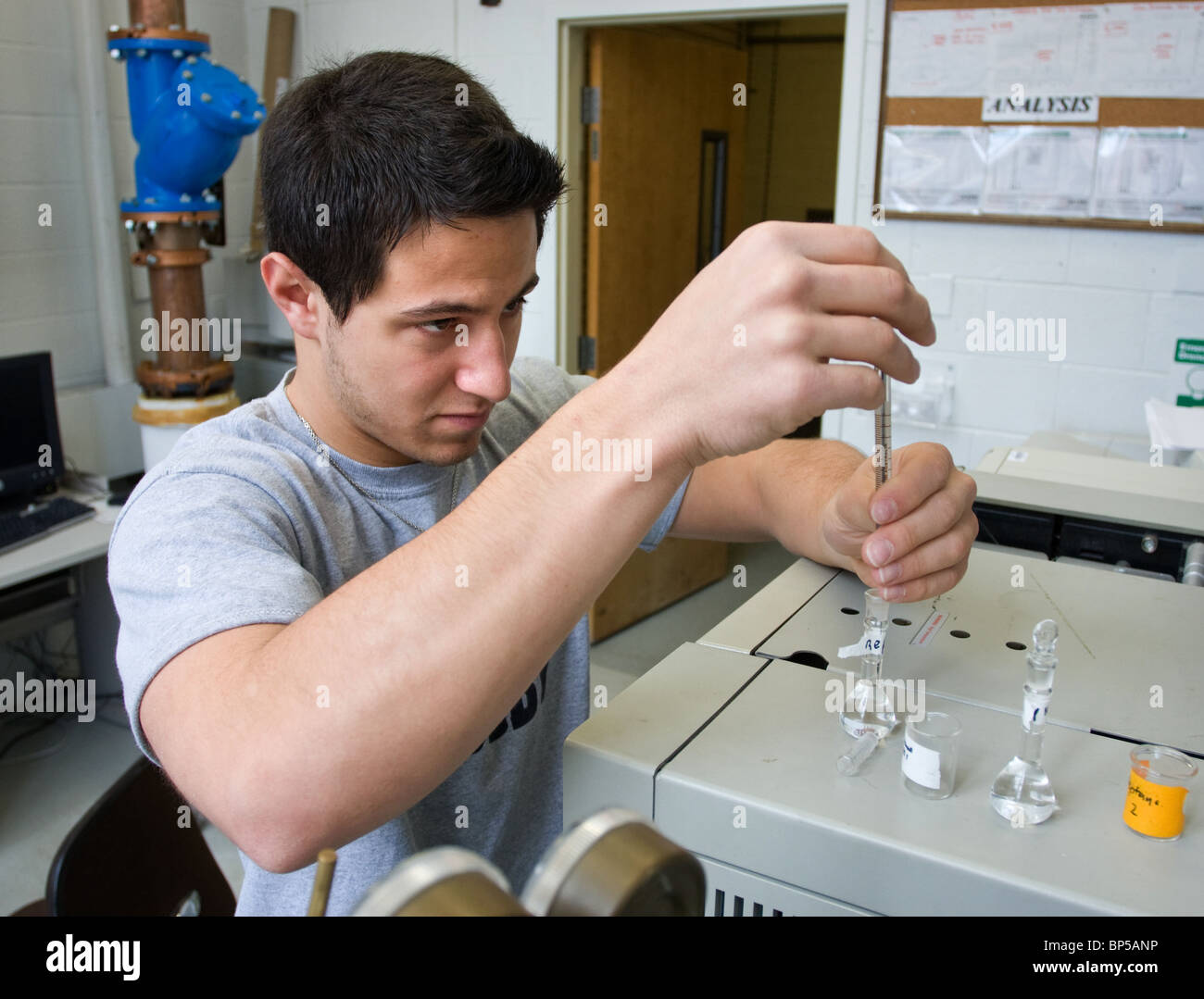 A college student at UCONN tests bio-fuel made from used cooking oil to be used in vehicles Stock Photo