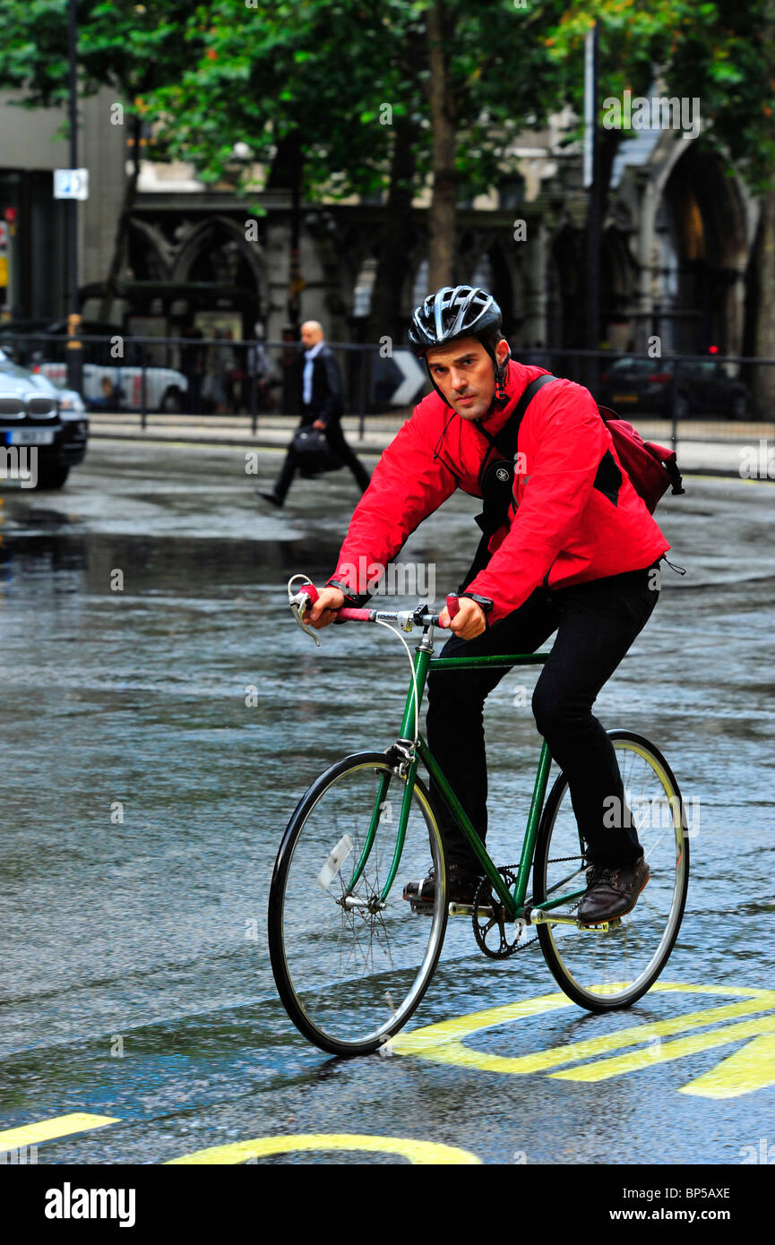 Cycling in the rain, London Stock Photo Alamy