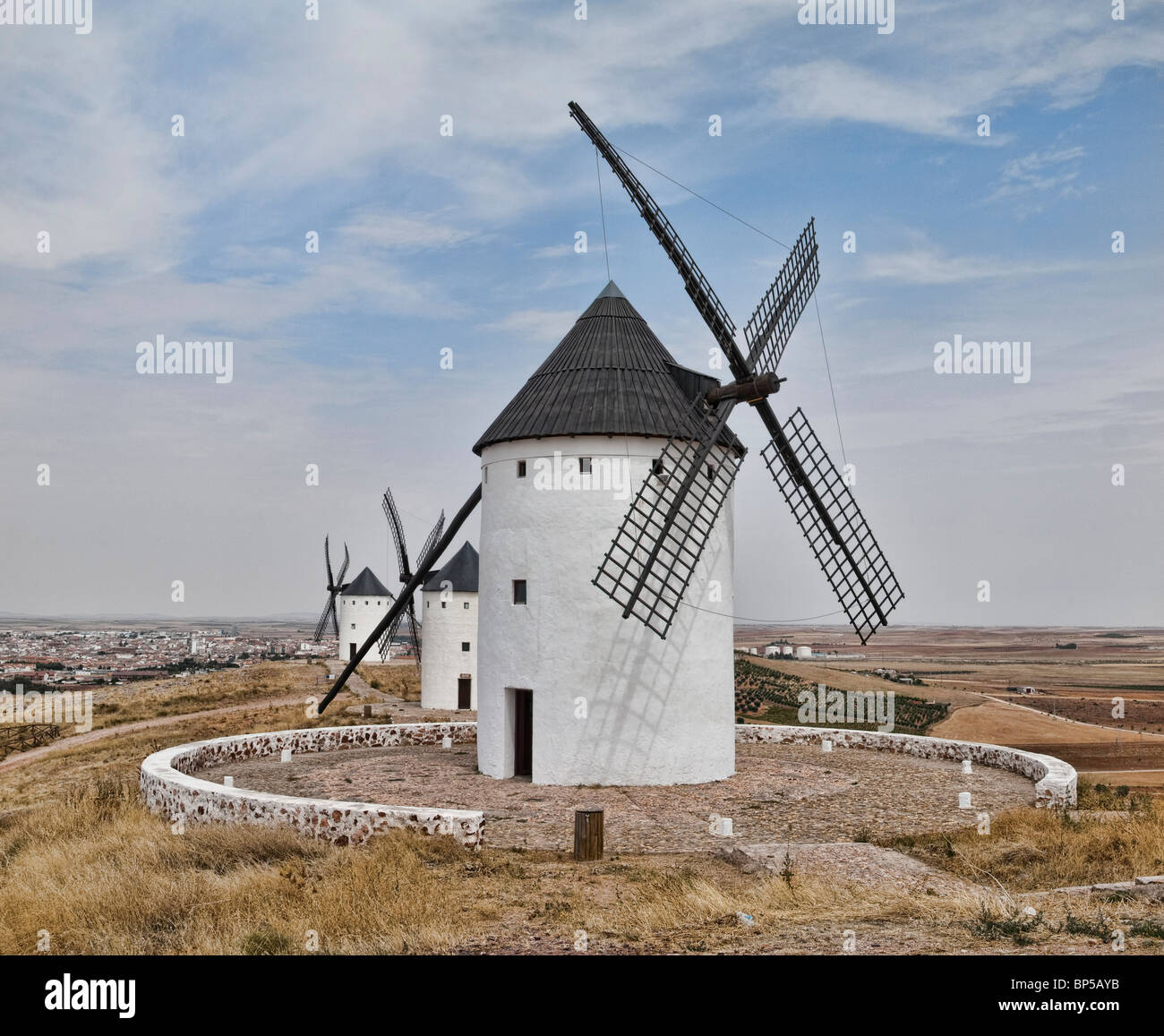 Windmills in a row at Alcázar de San Juan (La Mancha: Don Quixote's land) Stock Photo