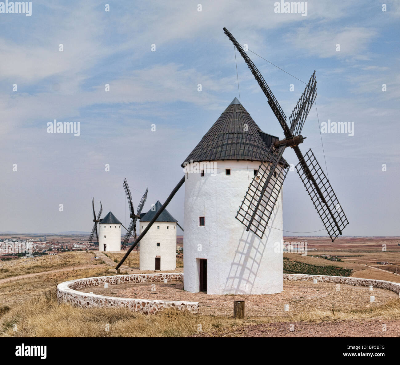 Windmills in a row at Alcázar de San Juan (La Mancha: Don Quixote's land) Stock Photo