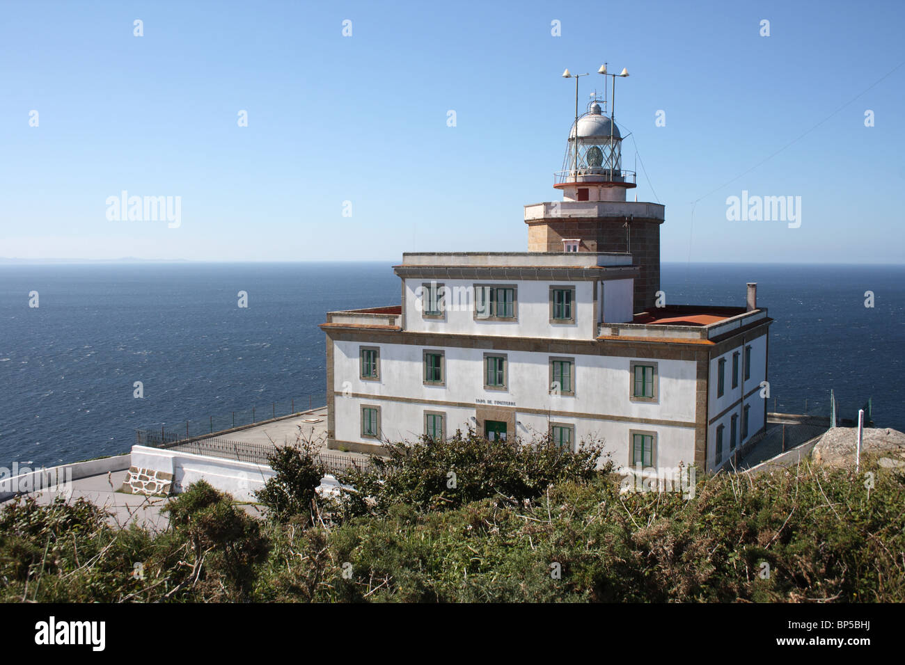 Lighthouse at Cabo Finisterre, Cap Fisterra, Galicia, Spain from above with a calm Atlantic behind Stock Photo