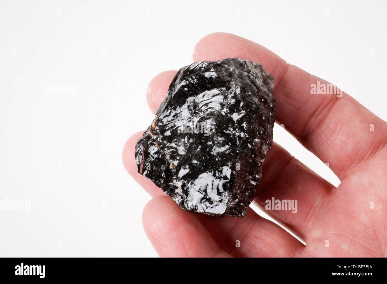 Obsidian volcanic rock Stock Photo - Alamy