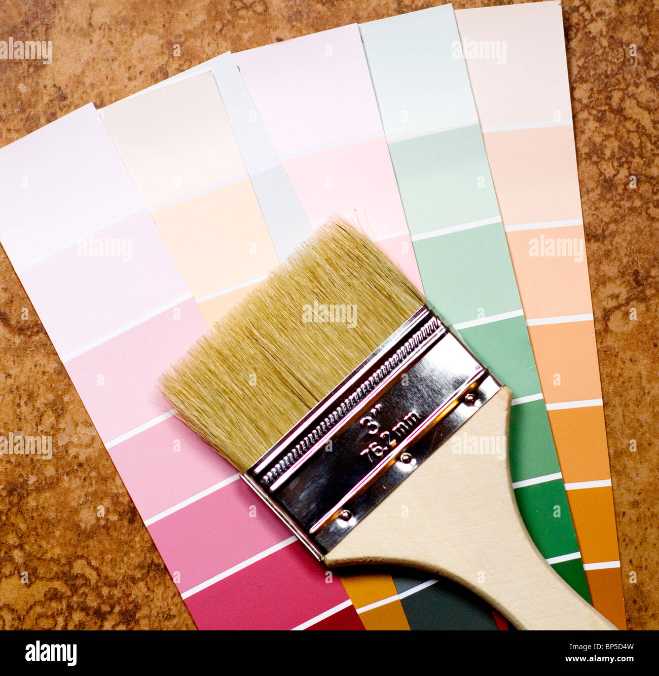 Paintbrush and paint samples Stock Photo