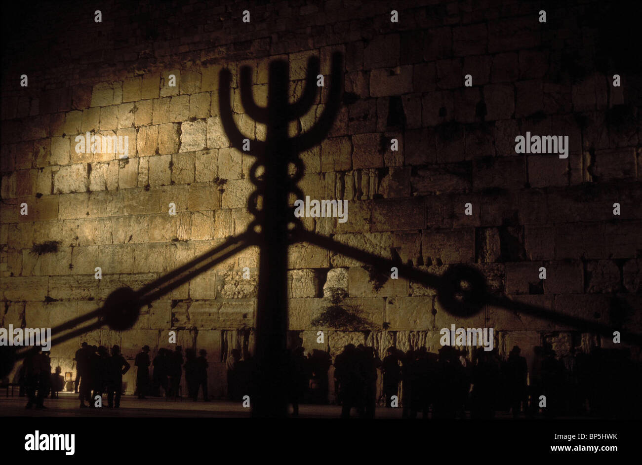 3363. PRAYING AT THE WESTERN WALL GOES ON UNINTERUPTED DAY AND NIGHT Stock Photo