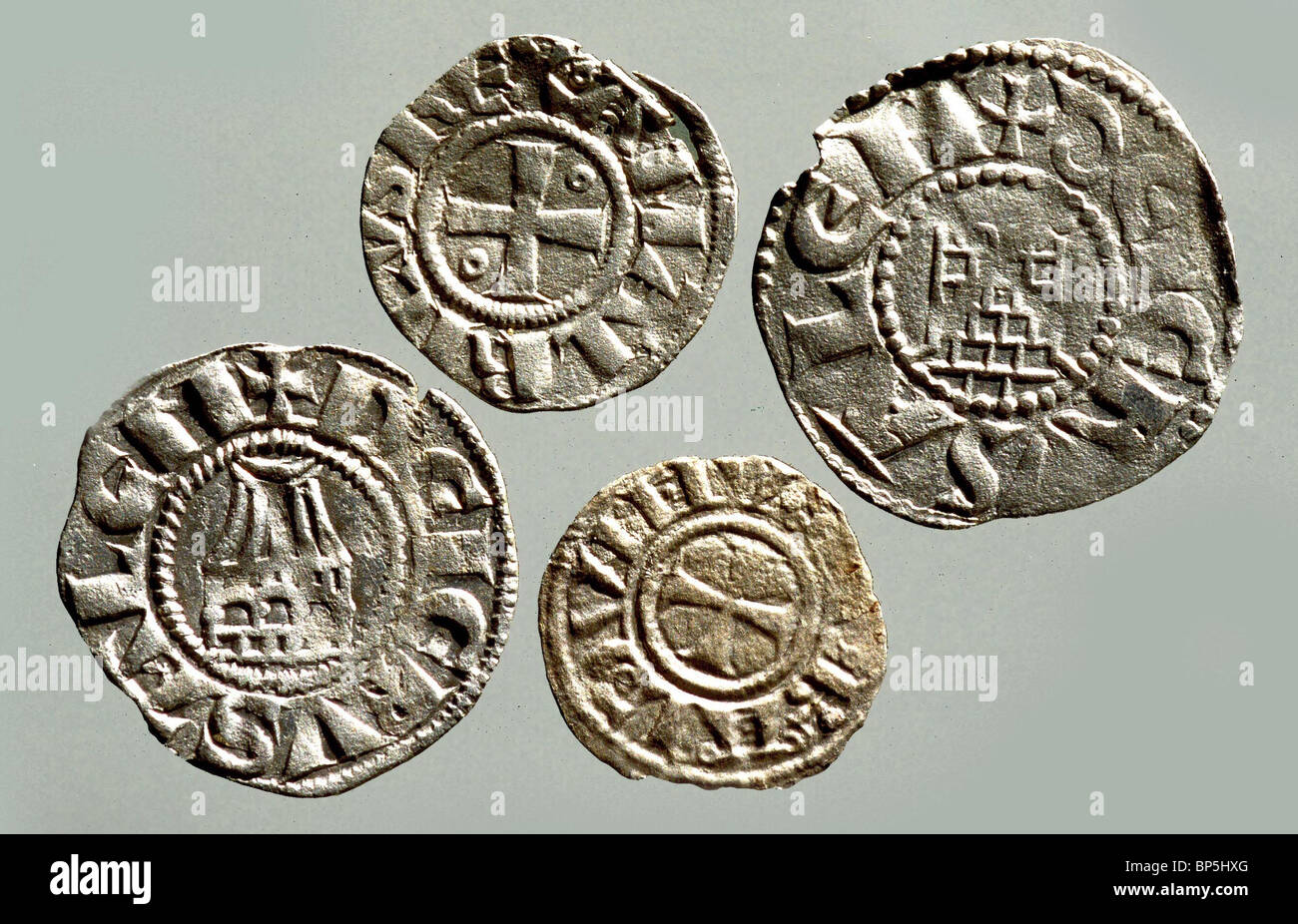 CRUSADER SILVER COINS ISSUED IN JERUSALEM DEPICTING THE CITY SYMBOLS: THE CHURCH OF THE HOLY SEPULCHER (ON THE LEFT) & THE Stock Photo