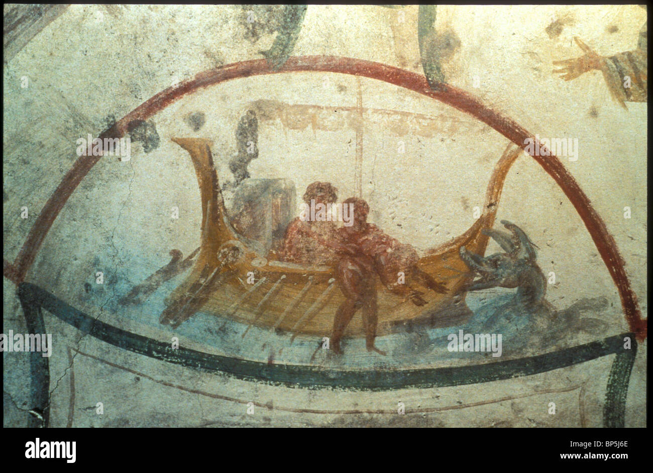 ROMAN CATACOMB WALL PAINTING DEPICTING THE PROPHET JONAH BEING THROWN OVERBOARD SYMBOLIZING THE ATMOSPHERE OF RESURECTION Stock Photo