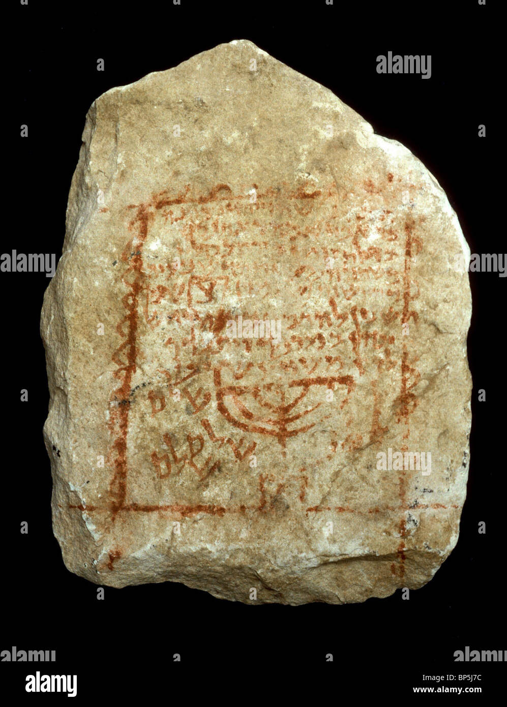 JEWISH TOMBSTONE INSCRIBED IN HEBREW & DECORATED WITH THE SEVEN BRANCHED CANDELABRA DATING FROM C. 5TH. C. AD.LARGE NUMBERS OF Stock Photo
