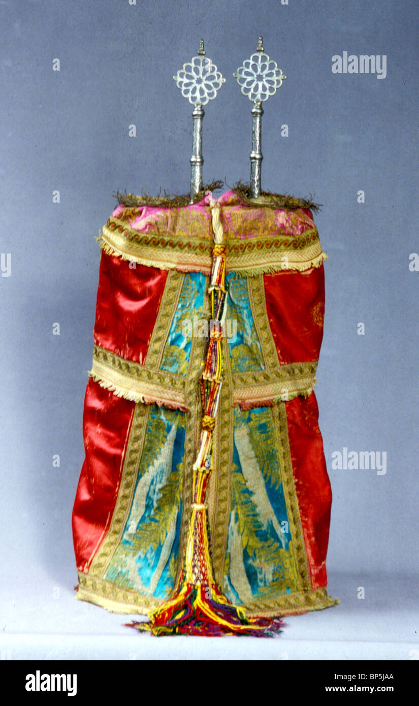 TORAH SCROLL WRAPPED IN IT'S SPECIAL COAT WITH FINIALS, MOROCCO, 19TH. C. Stock Photo
