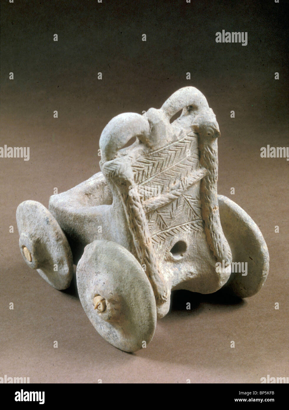 FOUR WHEELED TERRACOTTA MODEL OF A CHARIOT DEPICTS THE TYPE OF VEHICLE USED IN THE THIRD & EARLY SECOND MILLENNIUM B.C. & Jacob Stock Photo
