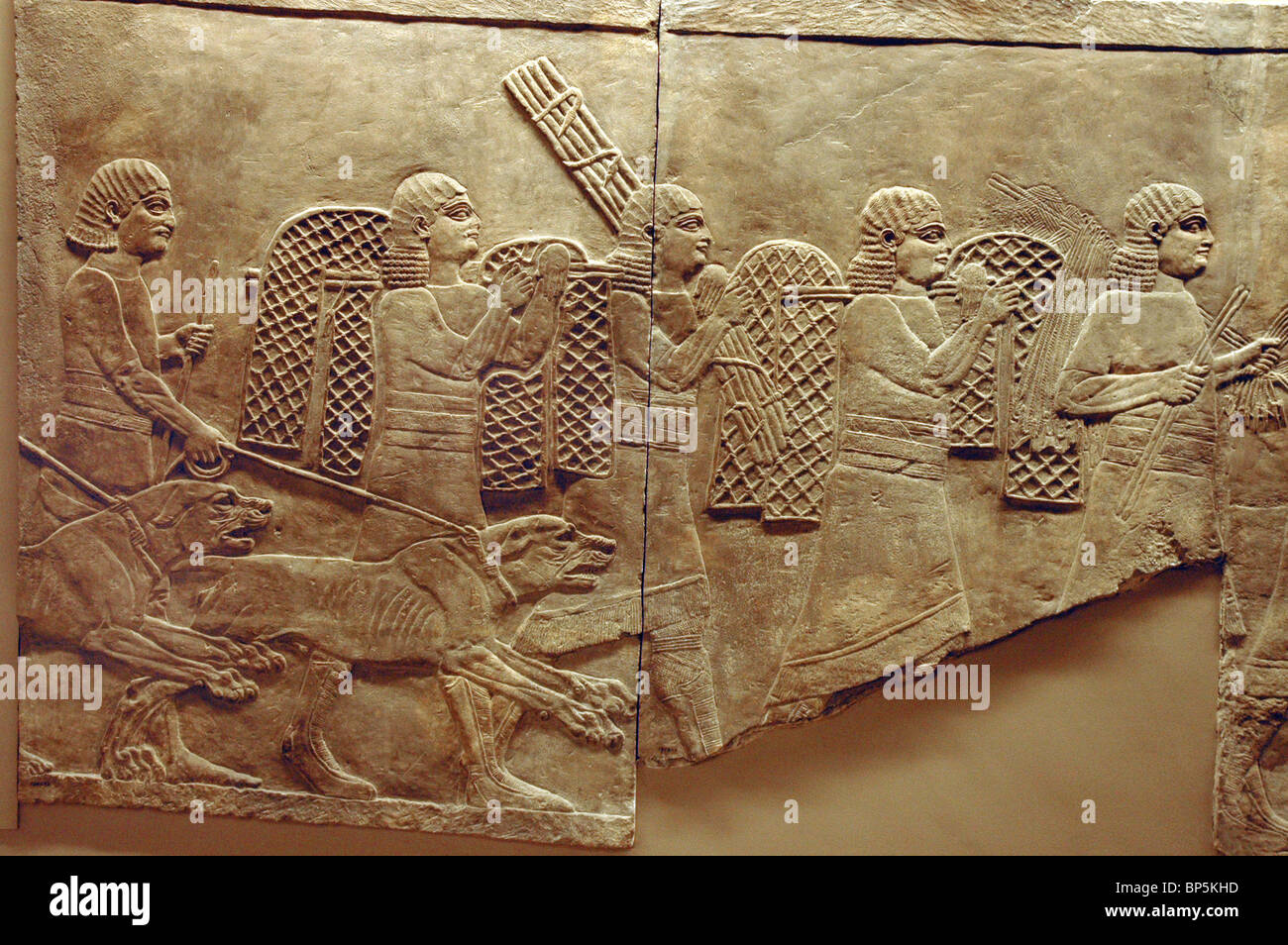 5246. GOING TO THE HUNT WITH NETS AND DOGS (MASTIFF). RELIEF FROM ASHURBANIPAL'S PALACE IN NINVEH DATING C. 645-640 BC Stock Photo