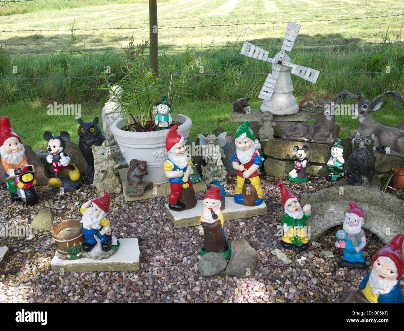 Gnomes and figurines in the grounds of Lathom Chapel, Lathom, West Lancashire, England,UK. Stock Photo