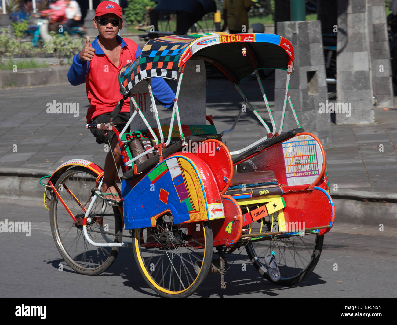 Indonesia, Java, Solo, becak driver, local transportation, people, Stock Photo